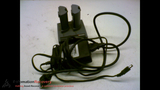 INTERMEC 069582 WITH ATTACHED PART NUMBER 073930  BATTERY CHARGER UNIT